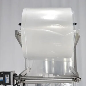 Detalle da máquina de envasado de bolsitas líquidas - Porta película colgante
